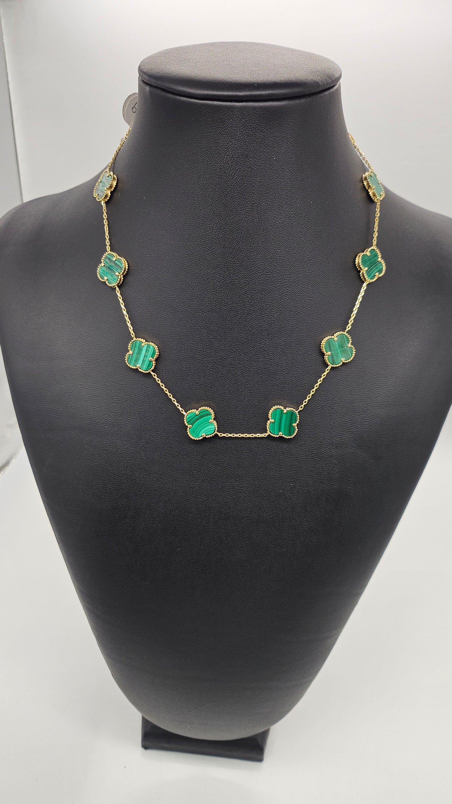 Green flower necklace.