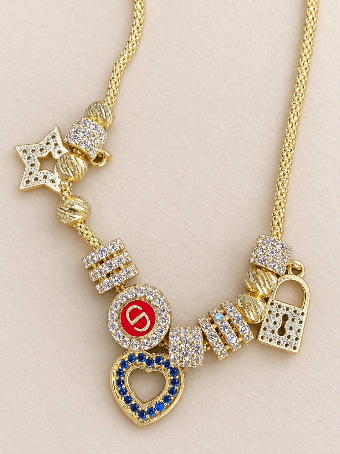 14K Yellow Gold 7” CZ Multi Charm Bracelet Heart Star Lock 9.05g
