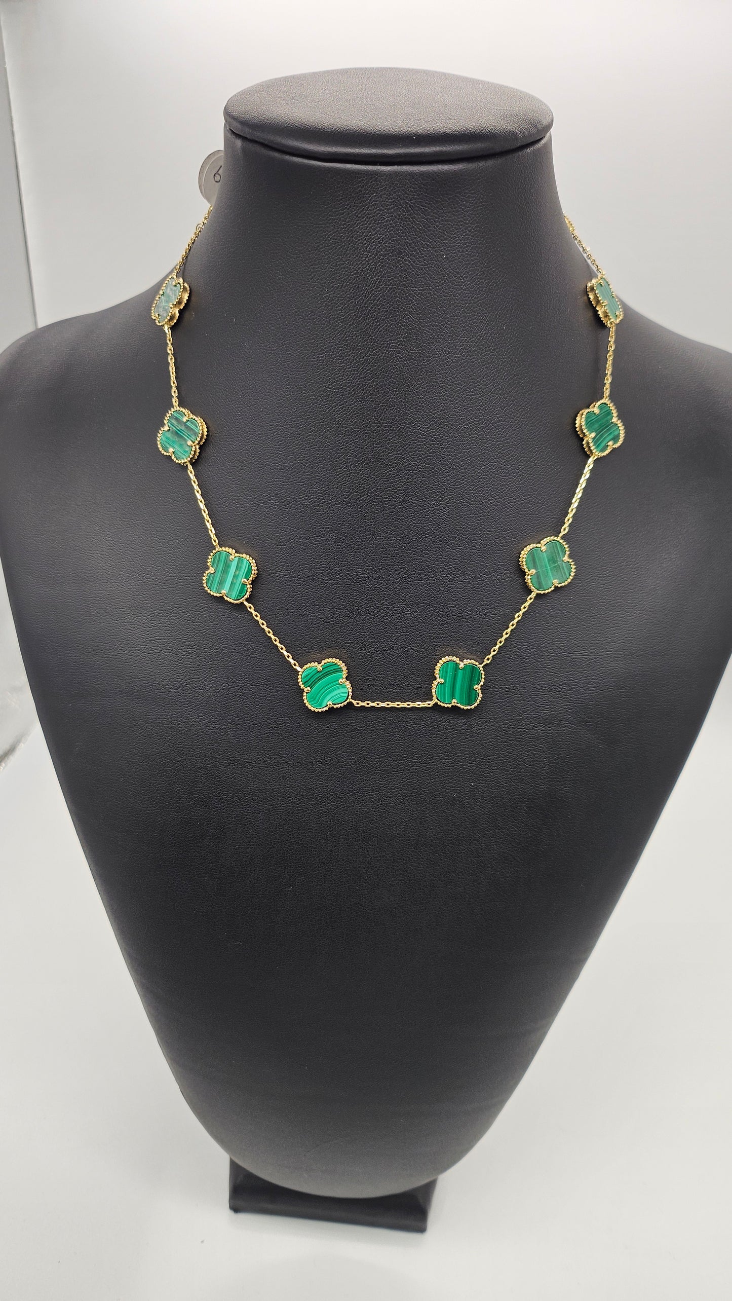 Green van cleef necklace.