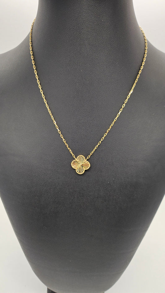 Golden flower necklace.