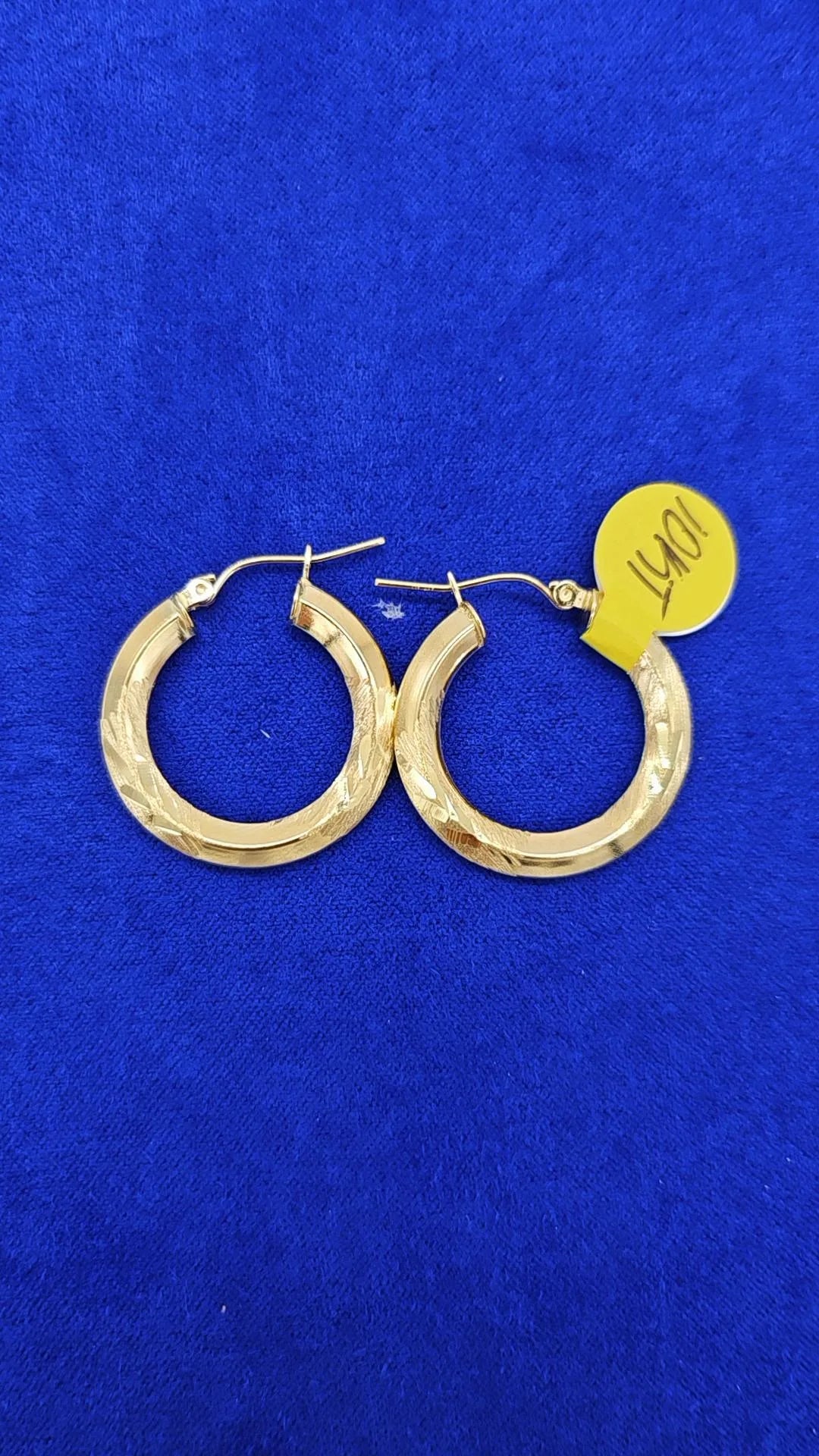 Tiny designer hoops