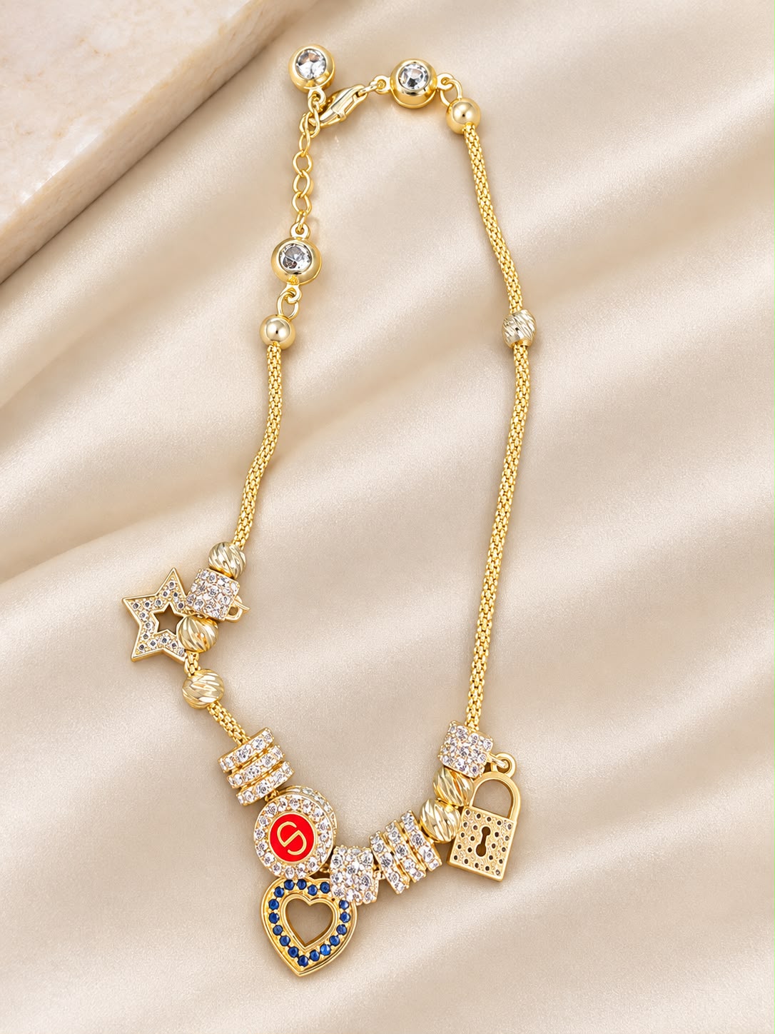 14K Yellow Gold 7” CZ Multi Charm Bracelet Heart Star Lock 9.05g