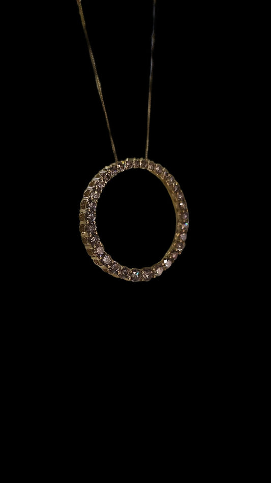 The golden circle charm